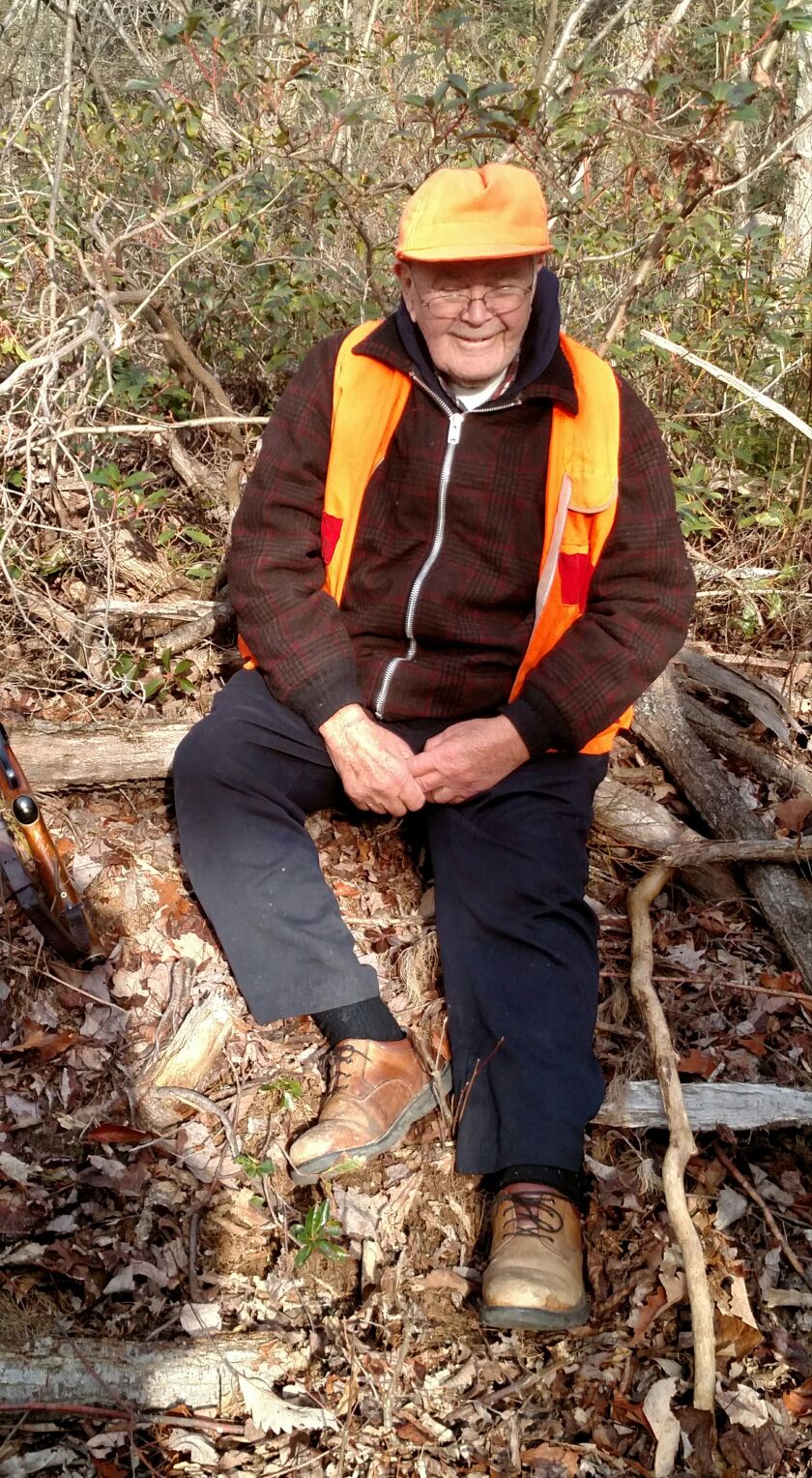 Leroy Bowman sitting on Paddy Mountain on what was likely his last hunt.<br>Credit: Dale Bowman