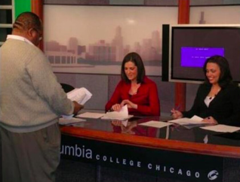 Steven Lattimore works with students at Columbia College Chicago. | Facebook photo