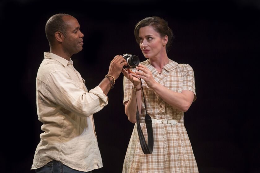 Nathaniel Stampley plays Robert Kincaid and Kathy Voytko is Francesca Johnson in the Marriott Theatre production of “The Bridges of Madison County.” | Liz Lauren