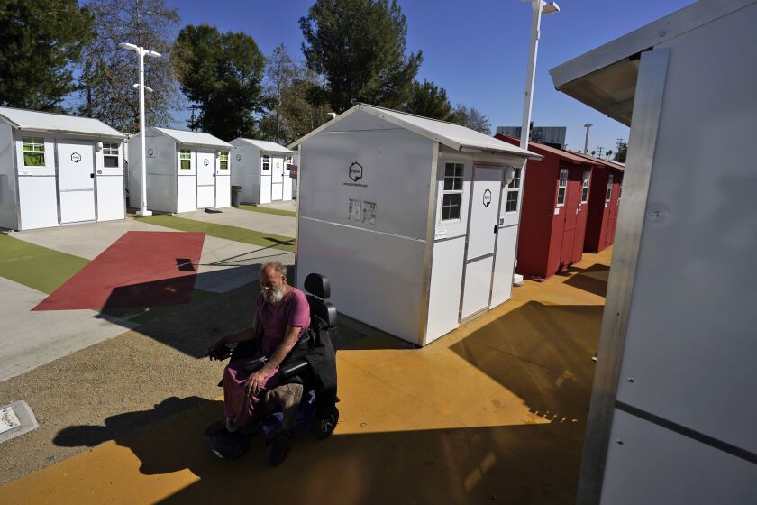 Press Engagement - Tiny homes supporters hoping for tryout 5 A development serving people who are homeless in Los Angeles.