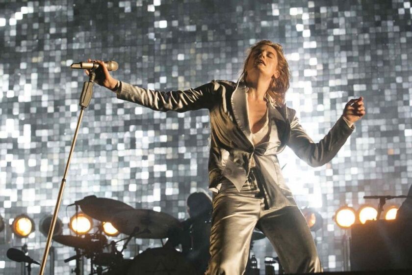 Florence Welch of Florence + The Machine performs Sunday at Lollapalooza. | Ashlee Rezin/For Sun-Times Media