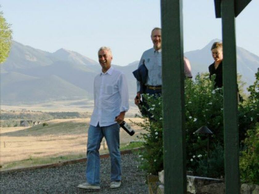 Rahm Emanuel (left) and Bruce Rauner (second from right) outside the Paradise Valley Grill near Livingston, Montana, in 2010. Emanuel is carrying a bottle of Napa Valley Reserve, a wine produced by an exclusive invitation-only club. | David S. Lewis/Monta