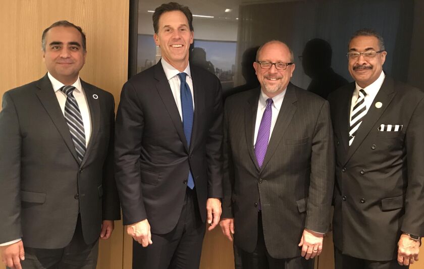 (L-R) Jorge Perez, Executive Director, Hispanic American Construction Industry Association (HACIA); Curt Bailey, President, Related Midwest; the Rev. Kevin Anthony Ford, Pastor, St. Paul Church of God in Christ; Don Biernacki, Vice President & Partner