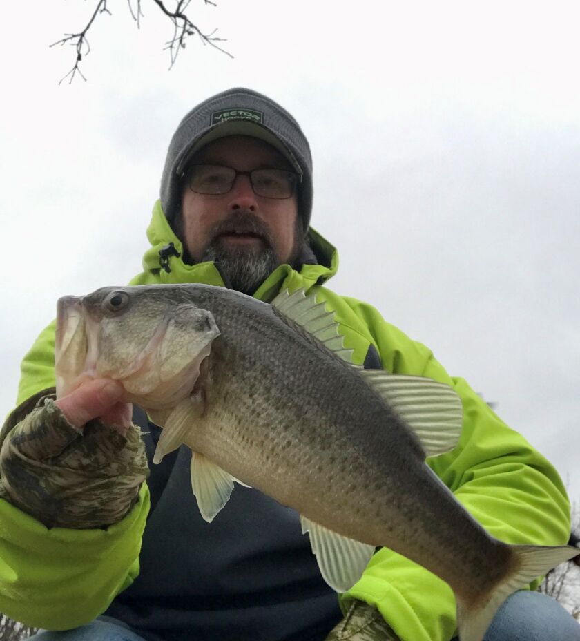 Ken “Husker” O’Malley with a late winter largemouth bass. Provided photo