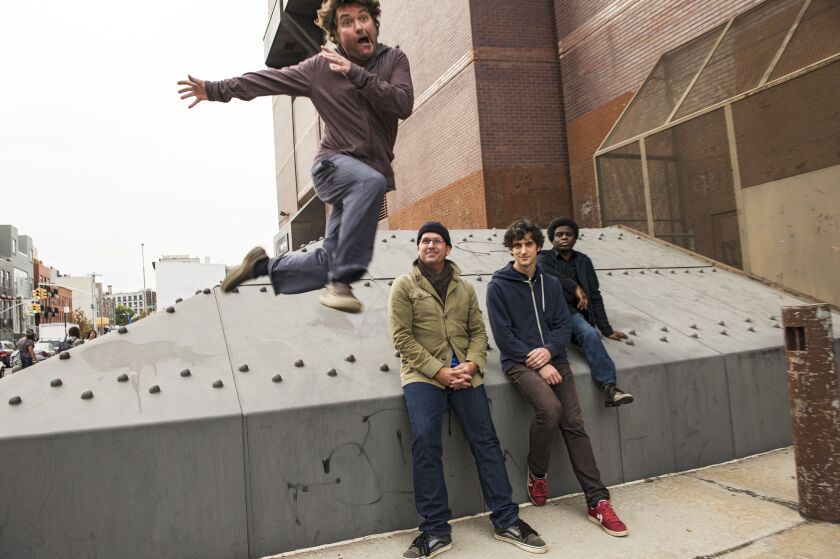 Keller Williams (in the air) with his band KWahtro. | PHOTO BY TAYLOR CROTHERS