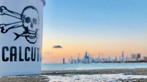 An artful shot of the Chicago skyline with a powerline set-up. Credit: Jason “Special One” Le