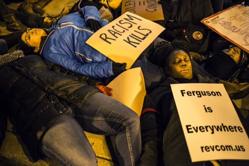 <small><strong>Hundreds of people took to the streets of Chicago on Thursday night, protesting recent high-profile police-involved incidents — including the New York grand jury’s decision not to indict a white police officer in the death of Eric Garner. |