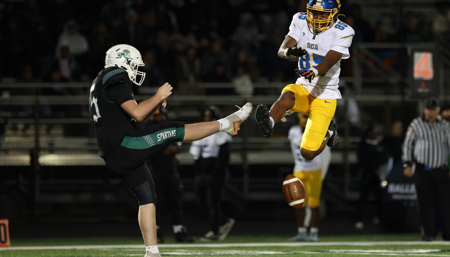 Eshun Flowers' punt-block TD sparks Simeon to a 6A playoff win over Oak Lawn