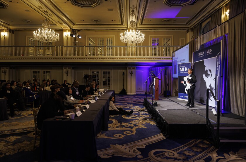 Kalani Cox-Dembry presents her speech to judges and an audience at the 7th annual MLK Jr. Oratory Competition at The Duke Hotel.