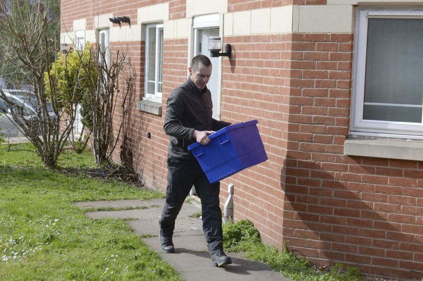Police activity at an address in Winson Green, Birmingham, England, on Thursday. Seven people were arrested and six addresses raided in London, Birmingham and elsewhere in connection with the terror attack Wednesday at and near the Houses of Parliament. |
