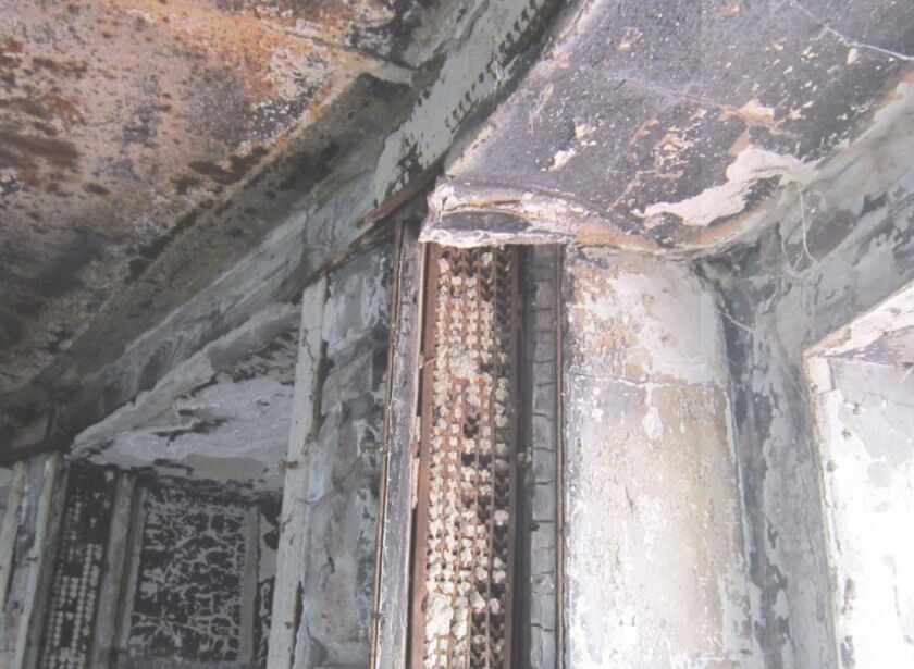Deterioration is evident near one of the lighthouse’s windows.