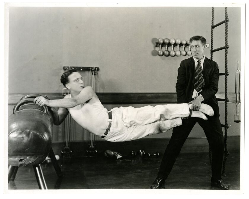 Arthur Shirley (left) and William S. Hart in “Branding Broadway.” | Artcraft Pictures