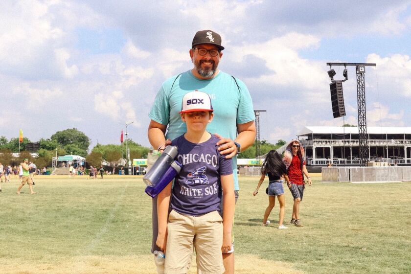 A North Side dad and his son rallied around the South Side team. | Kate Scott/For the Sun-Times