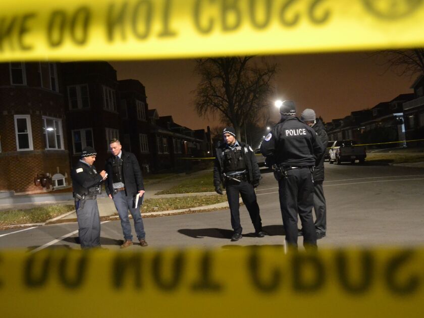 Police investigate a shooting about 11:30 p.m. Saturday, December 22, 2018 in the 8400 block of South Ada Avenue in Chicago. | Justin Jackson/ Sun-Times