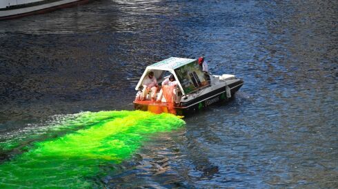 The Chicago River is dyed green Saturday.