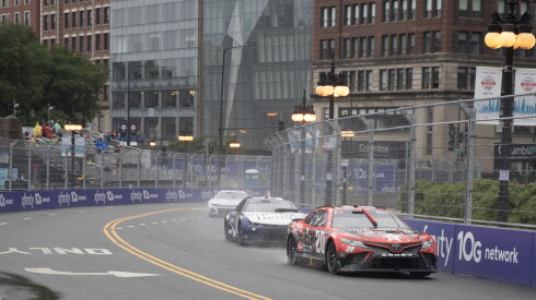 NASCAR race cars climb up Columbus Plaza during the Grant Park 220 NASCAR Chicago Street Race.