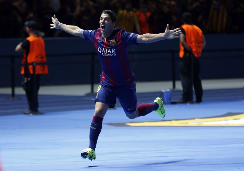 Barcelona’s Luis Suarez celebrates after scoring his side’s second goal during Barcelona’s 3-1 Champions League final victory Saturday over Juventus at the Olympic Stadium in Berlin. AP Photo