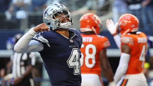 Cowboys quarterback Dak Prescott celebrates a touchdown Sunday against the Bears.
