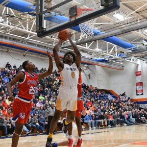 Simeon Sincere Callwood (4) attempts a shot against Curie, Saturday 12-29-18. Worsom Robinson/For Sun-Times