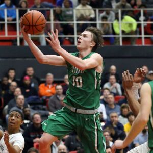 York’s Nathan Shockey (10) drives the lane against Whitney Young in their 58-56 loss in Hillside, Wednesday, March 6, 2019. | Kevin Tanaka/For the Sun Times