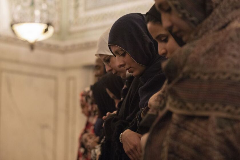 People pray at the Chicago Cultural Center on May 7, 2019. | Pat Nabong/For The Sun-Times