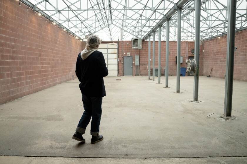 Letisha Steele, executive director of Green City Market, walks through the nonprofit's new building.