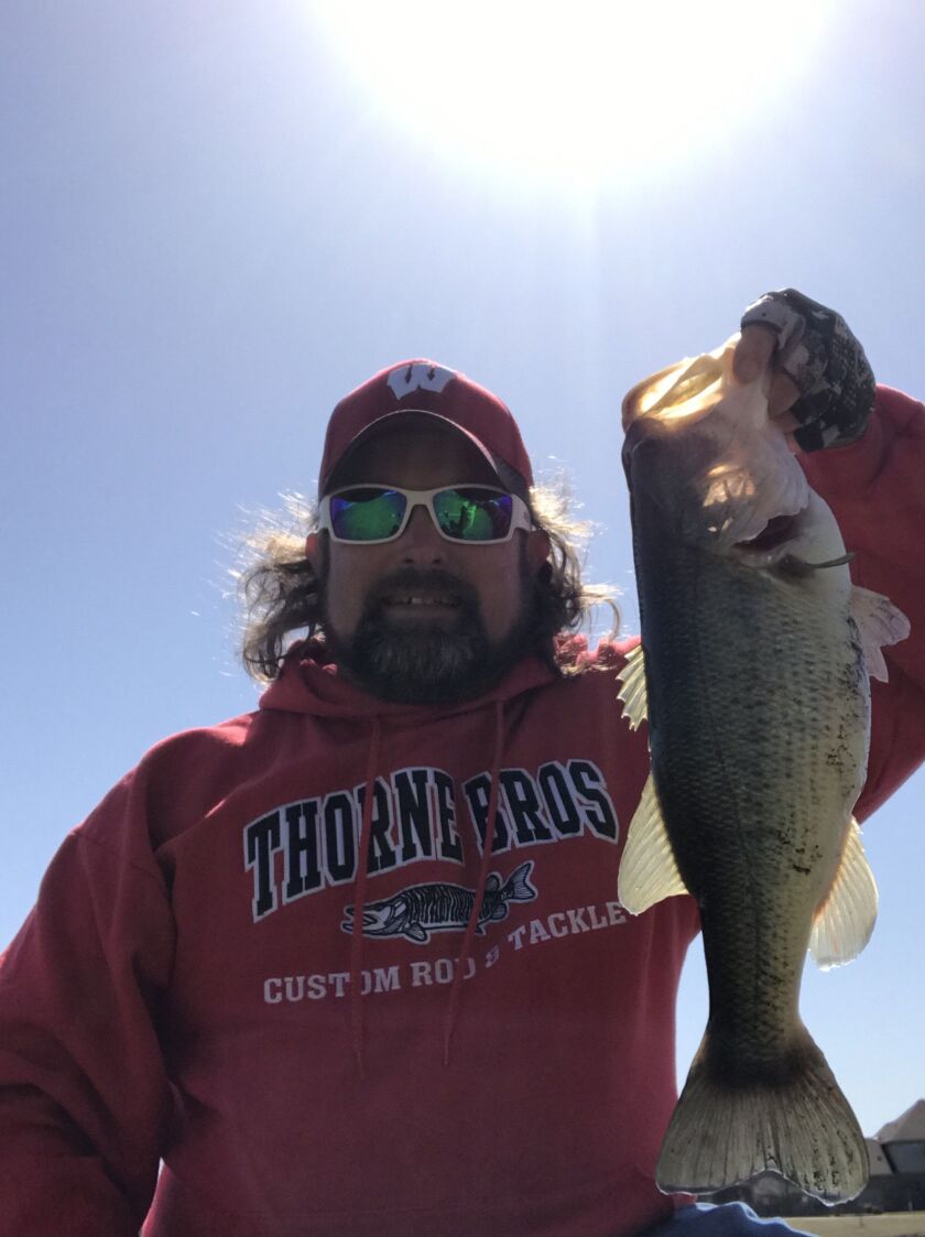 Ken “Husker” O’Malley with a spring largemouth bass. Provided photo
