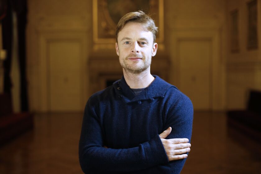 British choreographer Christopher Wheeldon who directed ”An American in Paris” poses at the “Theatre du Chatelet” in Paris, on November 12, 2014. | THOMAS SAMSON/AFP/Getty Images