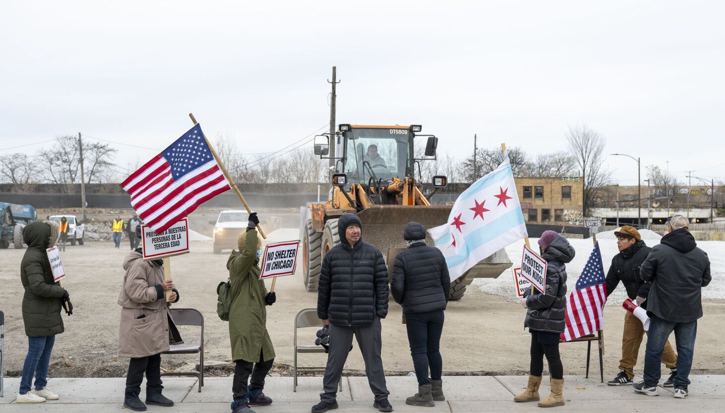 NextImg:Brighton Park migrant tent site construction blocked by protesters: ‘Show me the permit; I’m ready to go to jail.’