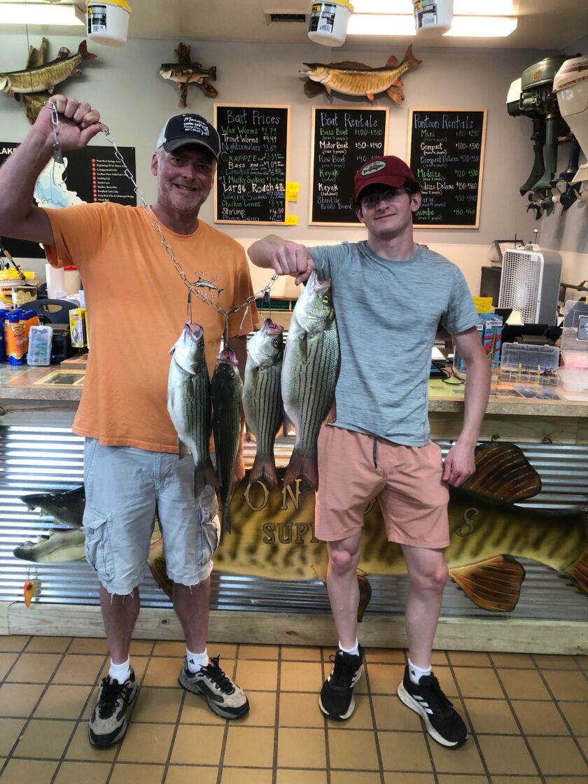 A father and son who did well Monday on hybrid striped bass at Shabbona Lake. Provided by Boondocks