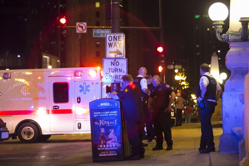 Chicago Police investigate at Wacker and Dearborn, where two men were shot on the Chicago Riverwalk early Sunday, June 11, 2017. | Ashlee Rezin/Sun-Times