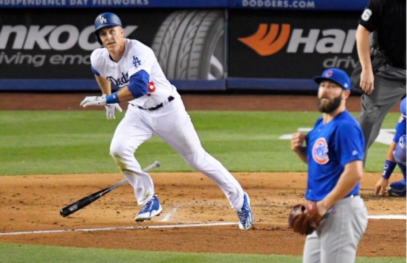 <em>Chase Utley hits a 1-1 pitch for a home run leading off the third. “I don’t intend to give up as much hard contact, especially balls over the fence,” said Arrieta, who struck out nine and walked one Friday. “But they just flat-out beat us tonight. Aft