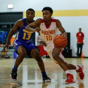 North Lawndale’s Ronald Chambers (10) moves the ball against Farragut.