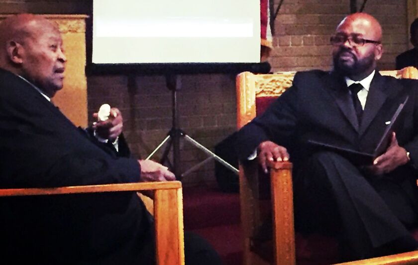 John Fountain interviewing his grandfather George Hagler Jan. 2017, at the True Vine Church of God in Bellwood, which Hagler founded in 1973. | Photo provided by John Fountain