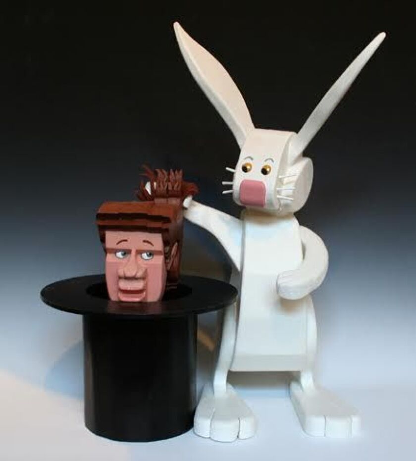 A wooden work by artist Steve Rebora, featuring his magician’s rabbit. | Supplied by Vale Craft Gallery.