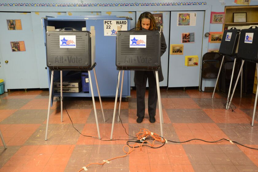 Keiana Barrett, candidate for alderman of the 7th Ward votes at St. Michaels, 8231 S. South Shore Dr. Tuesday, February 24, 2015 | Brian Jackson/ Sun-Times