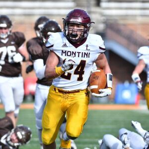 Montini’s Nick Fedanzo (24) runs into the end zone. Worsom Robinson/For the Sun-Times.