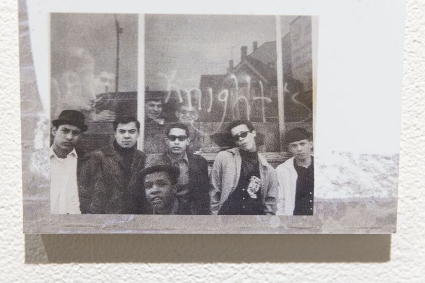 Photograph of Roman Villarreal (center).