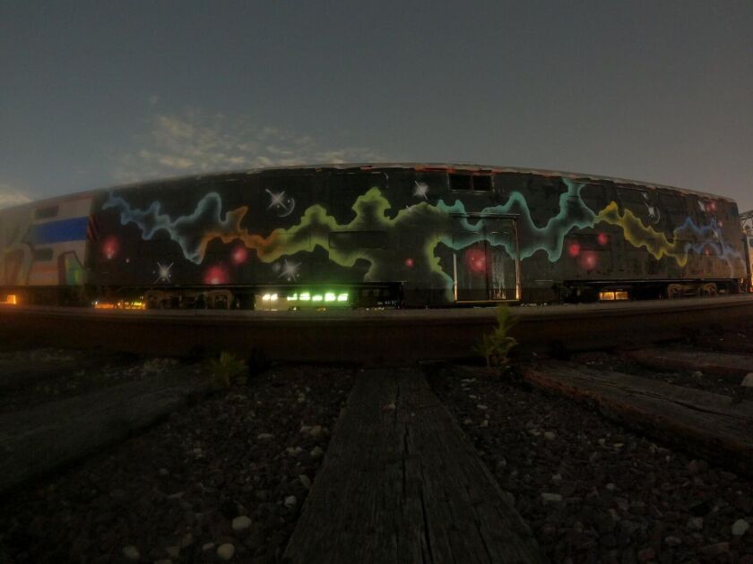 A Metra train after graffiti artist Joos added his touch.