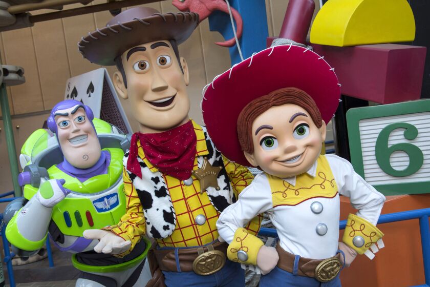 This undated photo provided by Walt Disney World, shows characters Buzz Lightyear, Sheriff Woody and Jessie the Yodeling Cowgirl. The trio will interact with guests in the new Toy Story Land set to open June 30, 2018 at Disney’s Hollywood Studios in Lake