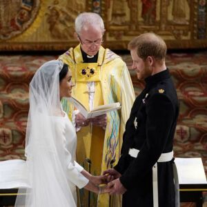 Britain’s Prince Harry, Duke of Sussex and US actress Meghan Markle during their wedding ceremony. | OWEN HUMPHREYS/AFP/Getty Images