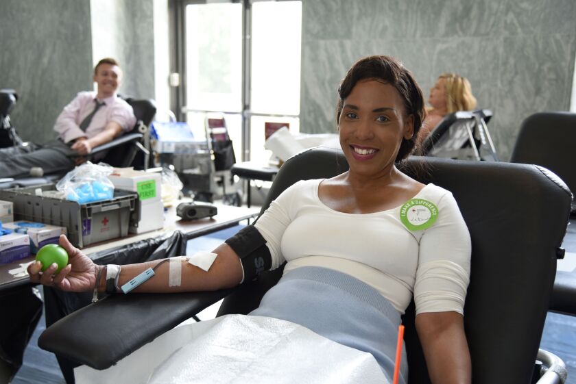 LaDeodra Drummond donates blood a June 2017 drive at the Rayburn House Building, Capitol Hill, in Washington, D.C. | Jeanette Ortiz-Osorio/American Red Cross