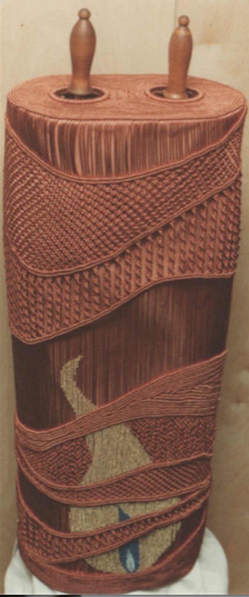 Barbara Lewis hand-knotted a case for a recovered WWII Torah. / Family photo