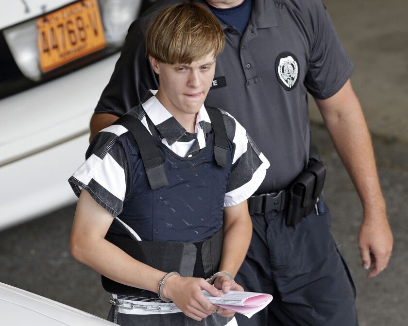 Dylann Storm Roof is escorted from the Cleveland County Courthouse in Shelby, N.C., on Thursday. | Chuck Burton/AP