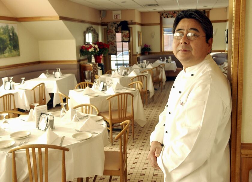 The late chef Yoshi Katsumura at his restaurant, Yoshi’s Cafe, in 2005.