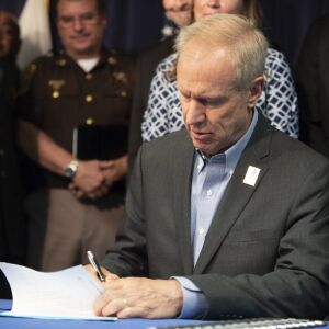 Governor Bruce Rauner signs HB 2354 at the Thompson Center in Chicago, Illinois on July 16, 2018. | Colin Boyle/Sun-Times