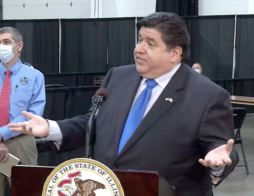 Gov. J.B. Pritzker speaks Wednesday at a mass vaccination site in downstate Quincy.