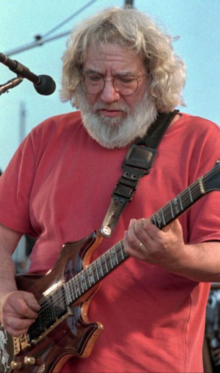 Legendary leader of the Grateful Dead, Jerry Garcia performs during a concert in Highgate, Vt., in this June 15, 1995 file photo. | AP Photo/Toby Talbot, File