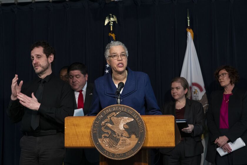 Cook County Board President Toni Preckwinkle with Gov. J.B. Pritzker and other elected and health officials.