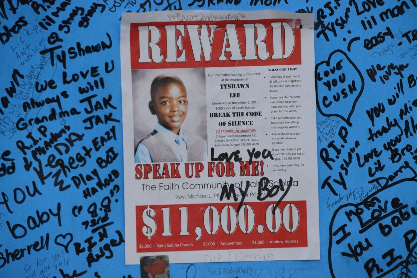Pierre Stokes, Tyshawn Lee’s father wrote “Love You My Boy” at the memorial where his son was killed. Thursday, November 5, 2015. Brian Jackson/ For the Chicago Sun-Times